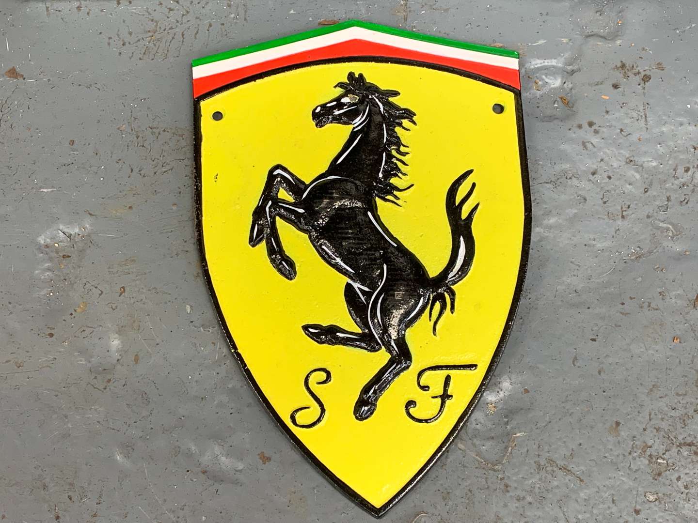 <p>Painted Ferrari Sign and Cast Iron Plaque (2)</p>