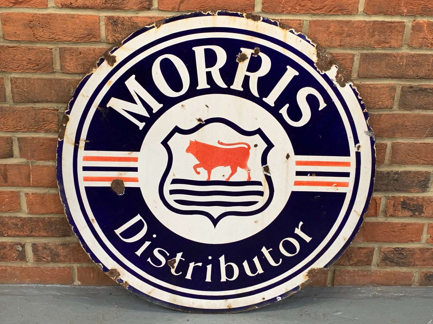 <p>Enamel Morris Distributor Circular Sign</p>