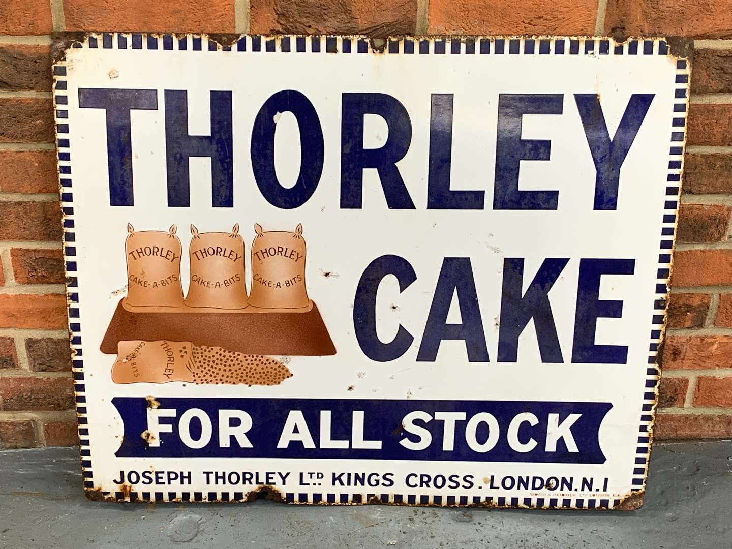 <p>Enamel Thorleys Cake Sign</p>