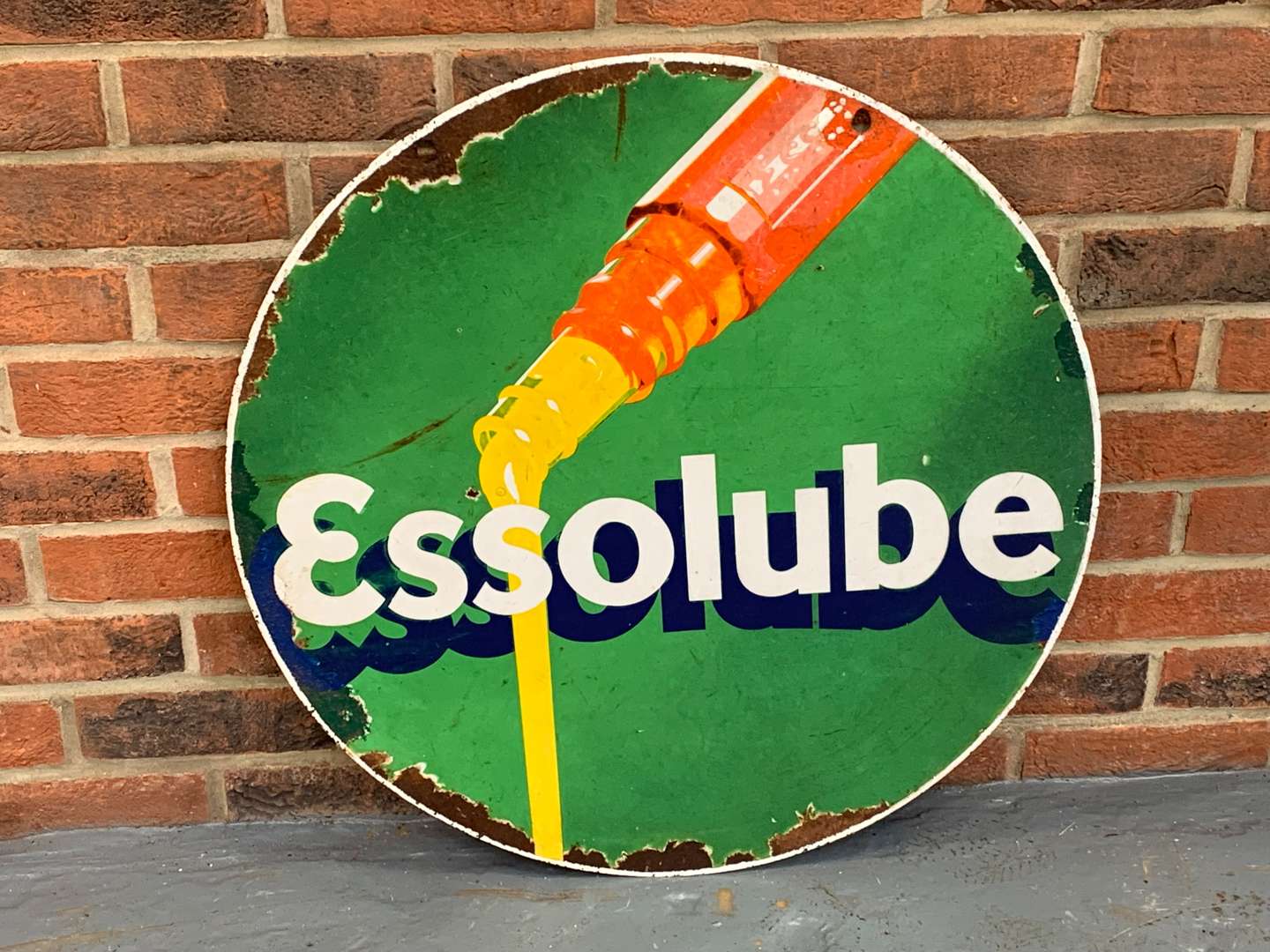 <p>Enamel Essolube Circular Sign</p>