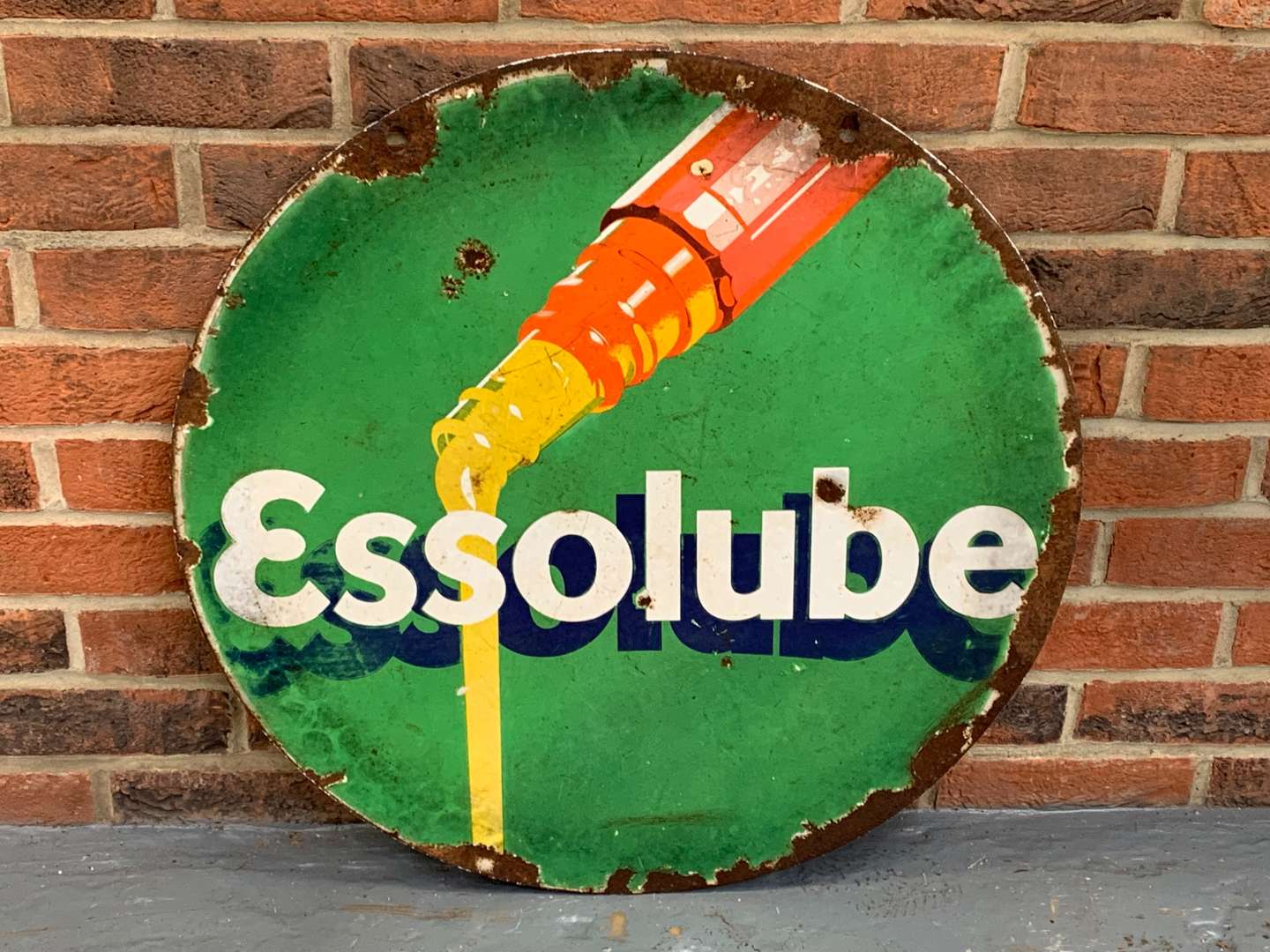 <p>Enamel Essolube Circular Sign</p>