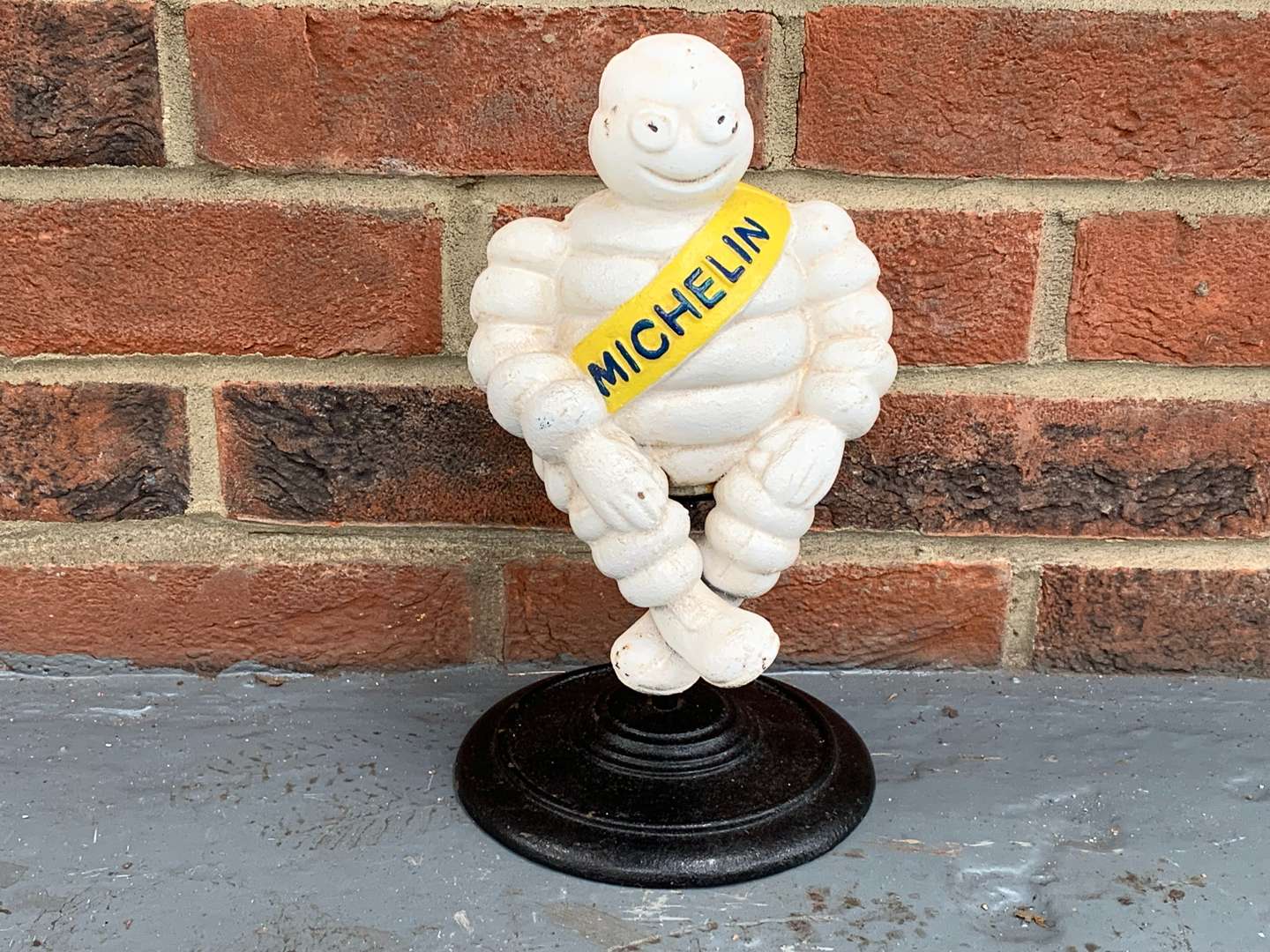 <p>Cast Iron Seated Michelin Man Figure&nbsp;</p>