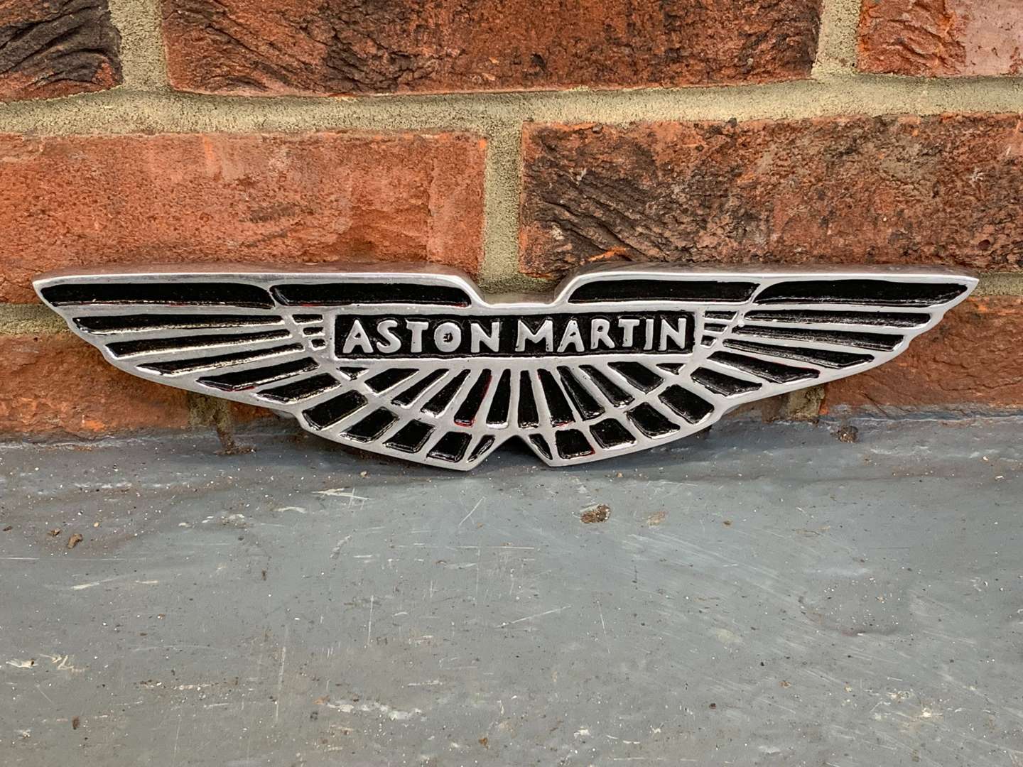 <p>Small Cast Aluminium Aston Martin Emblem Sign</p>