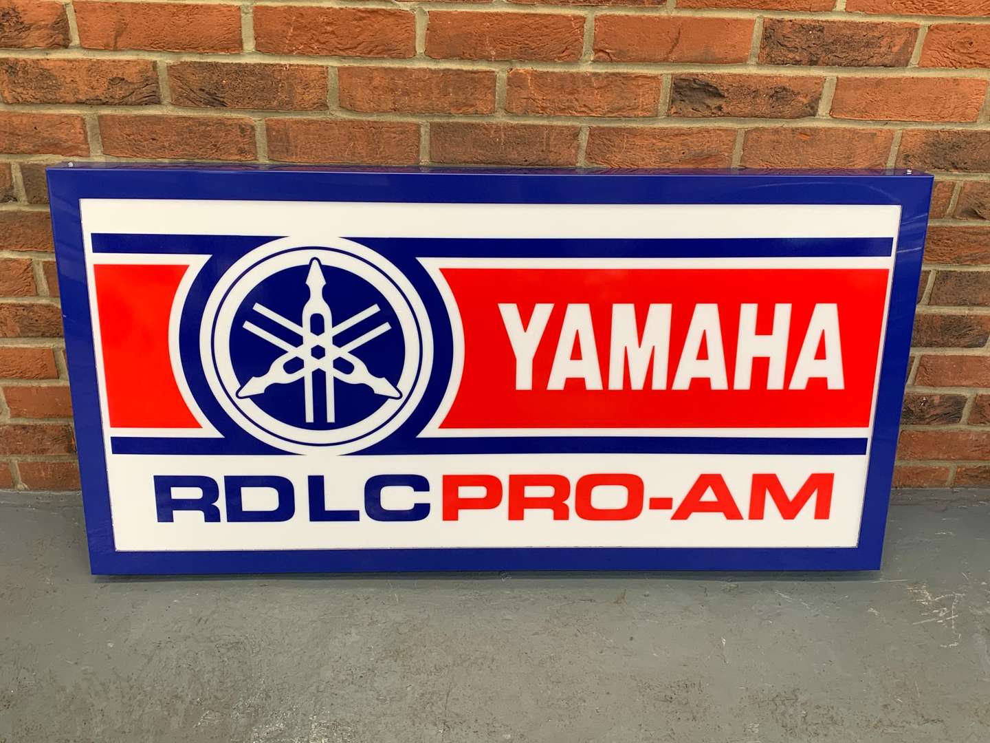 <p>Modern Metal Framed Yamaha RDLC Pro-AM Illuminated Sign</p>