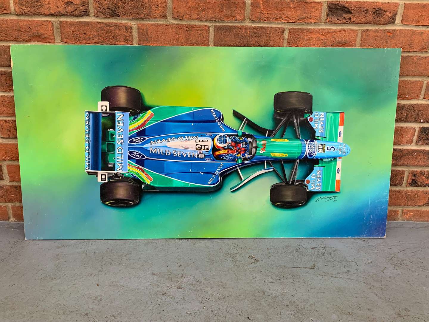 <p>Painted on Board Formula1 Car By C Thompson Dated 94</p>