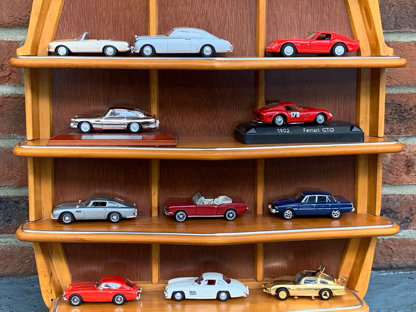 <p>Teak Framed “Classic Cars of The 60's” Shelf and Cars</p>