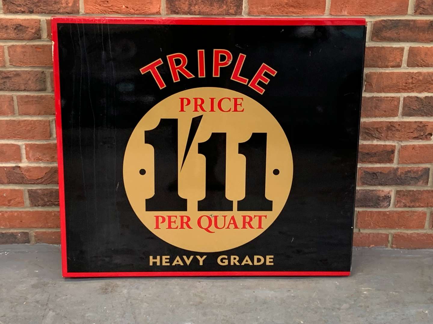 <p>Metal Triple Price 1'11 Per Quart Sign</p>