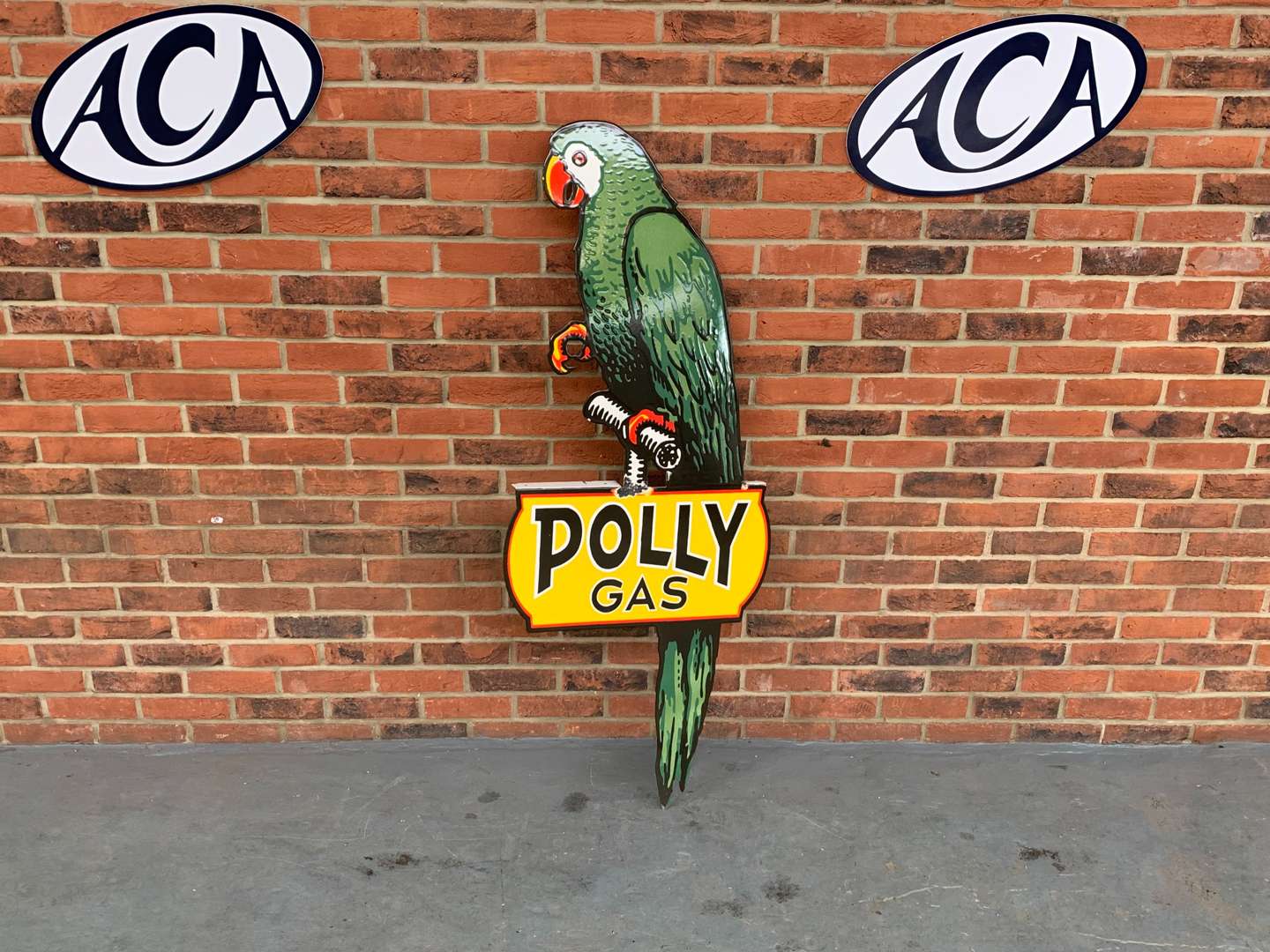 <p>Enamel Large Polly Gas Sign</p>