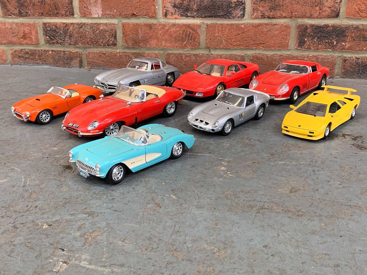 <p>Eight Die Cast Models, To Include Ferrari, AC Cobra, Mercedes 300sl Etc</p>