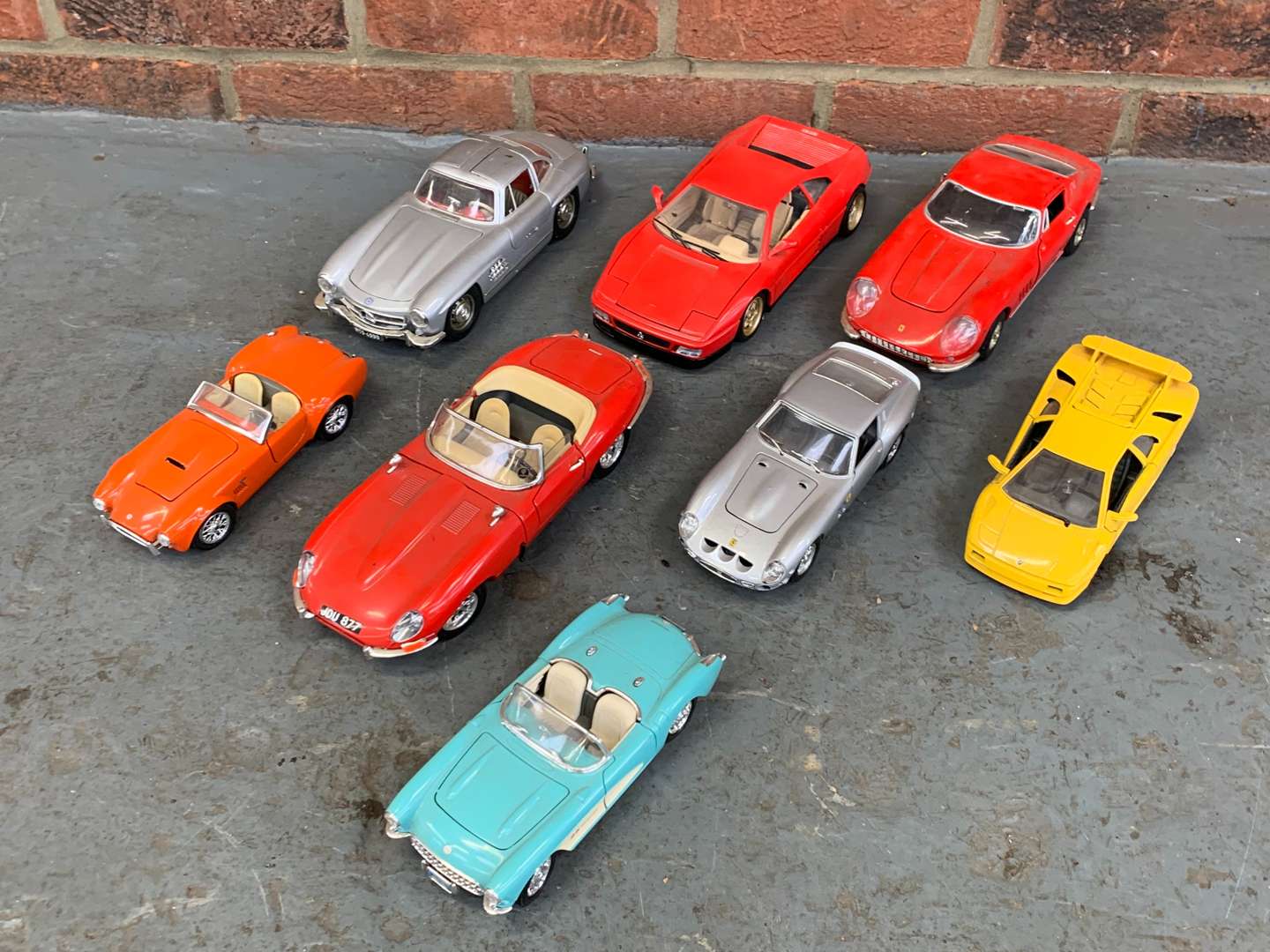 <p>Eight Die Cast Models, To Include Ferrari, AC Cobra, Mercedes 300sl Etc</p>