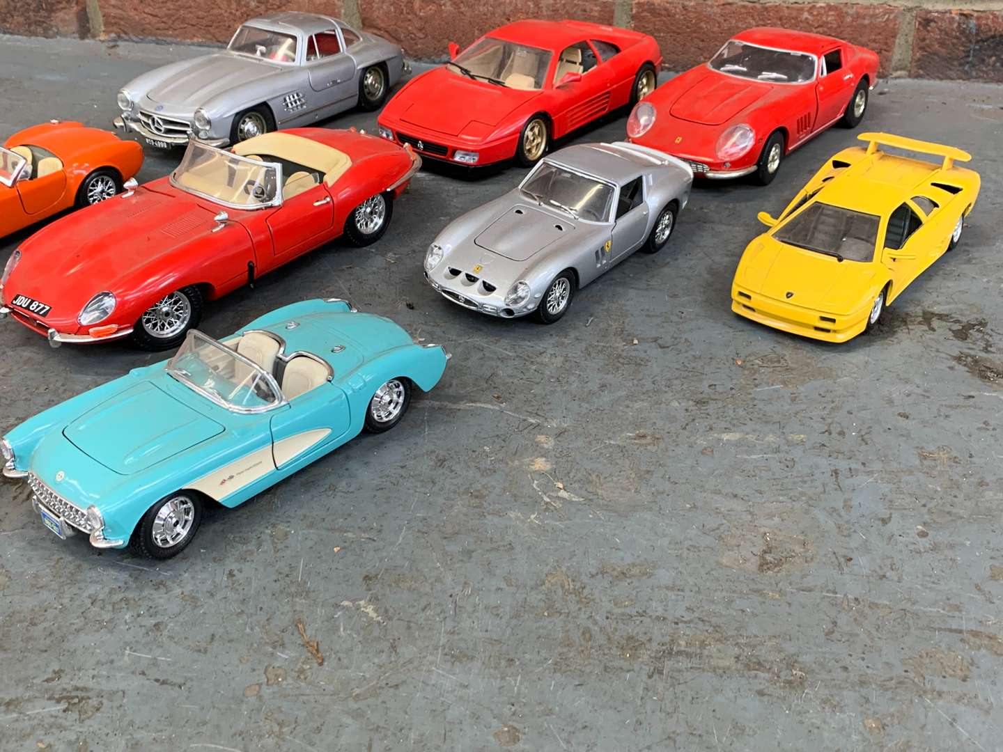 <p>Eight Die Cast Models, To Include Ferrari, AC Cobra, Mercedes 300sl Etc</p>