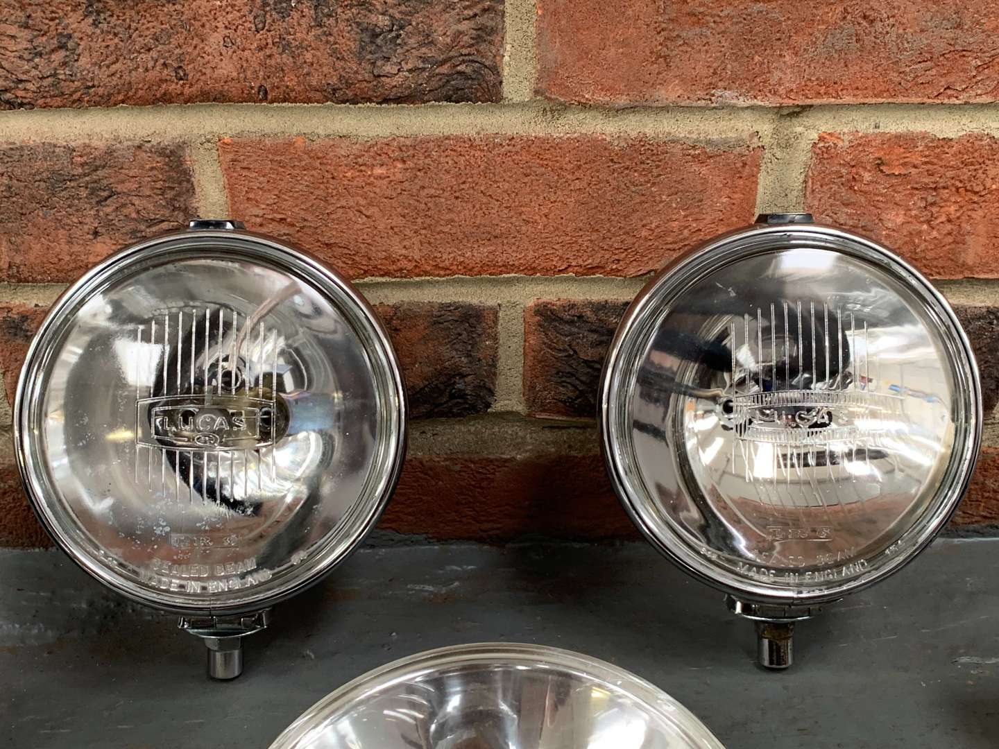 <p>Pair of Chrome Lucas and Bosch Lights and Covers (4)</p>