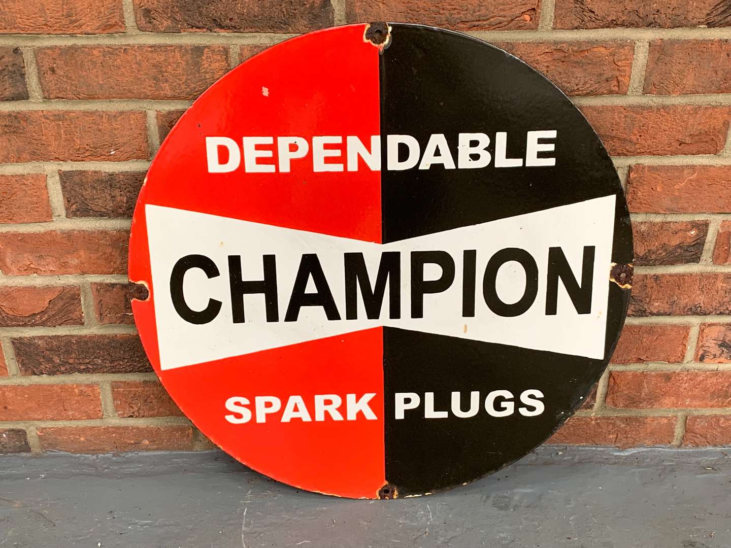 <p>Enamel Champion Dependable Spark Plug Sign</p>