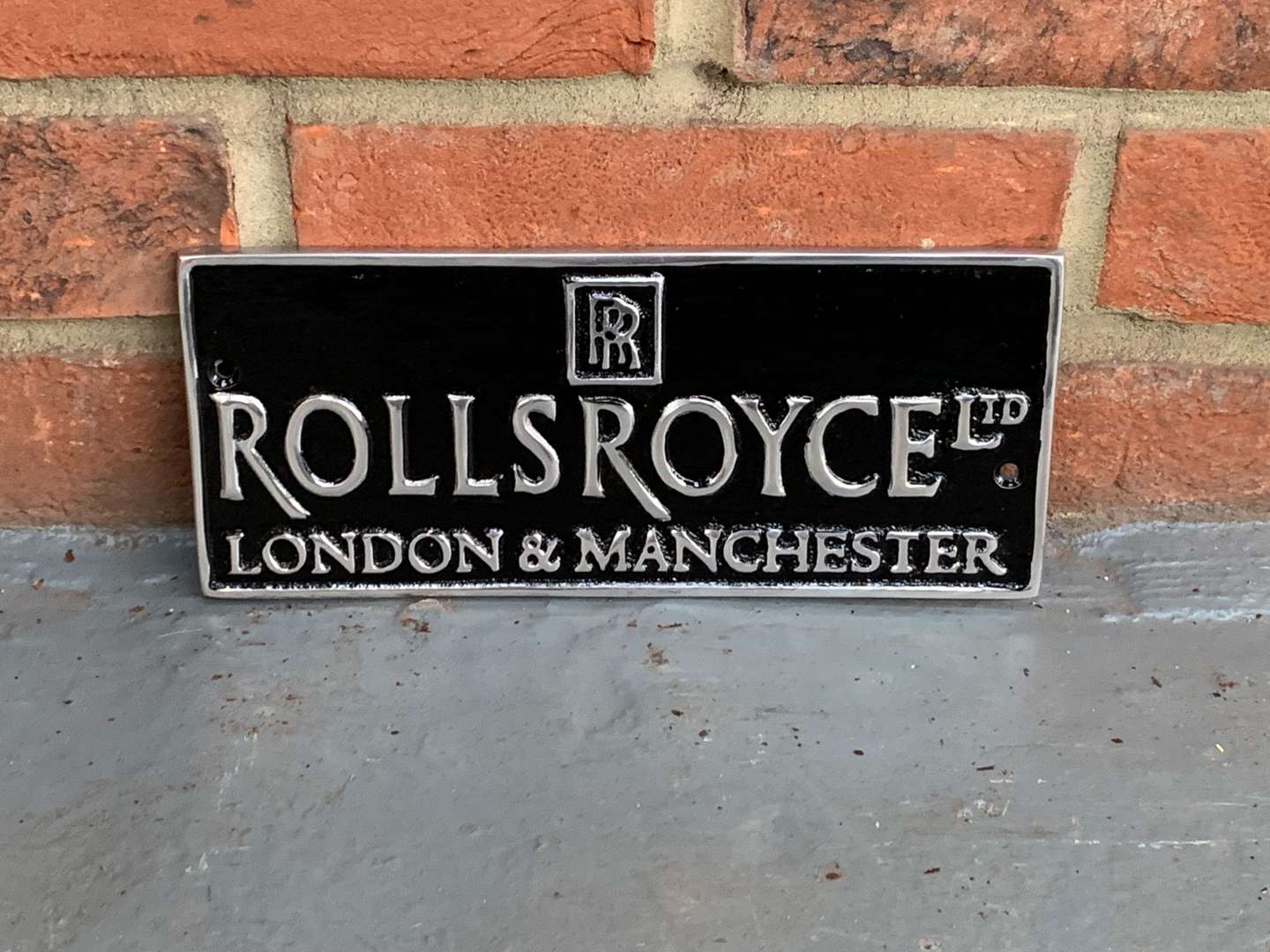 <p>Cast Aluminium Rolls Royce London and Manchester Sign</p>