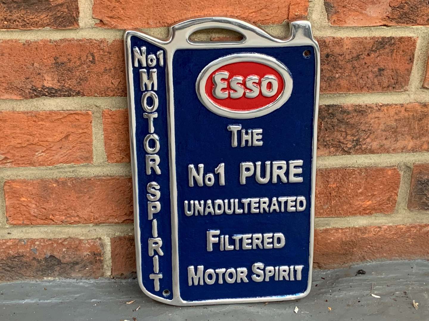 <p>Cast Aluminium Esso Filtered Motor Spirit Sign</p>