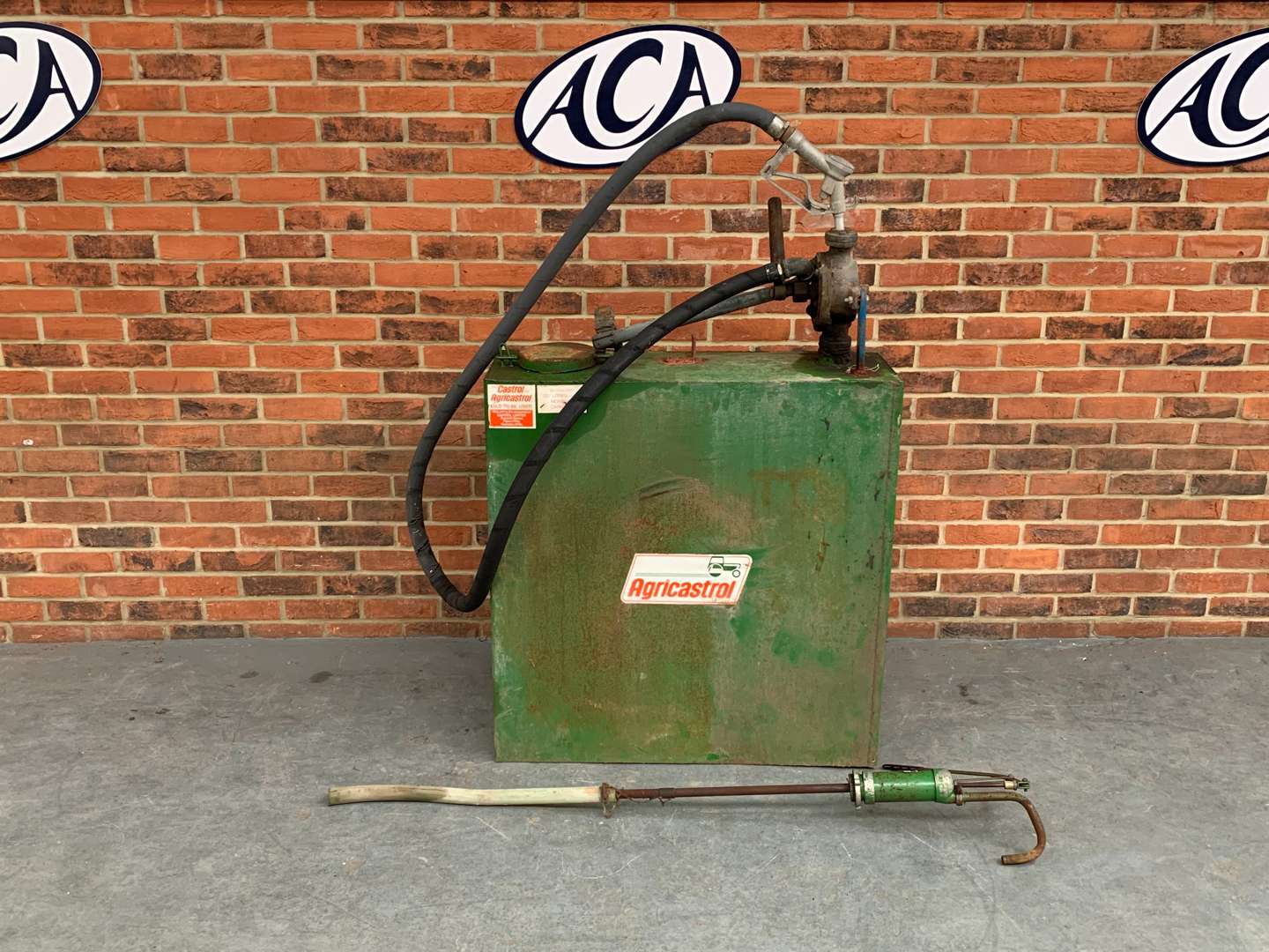 <p>Castrol Oil Dispenser and Pump</p>