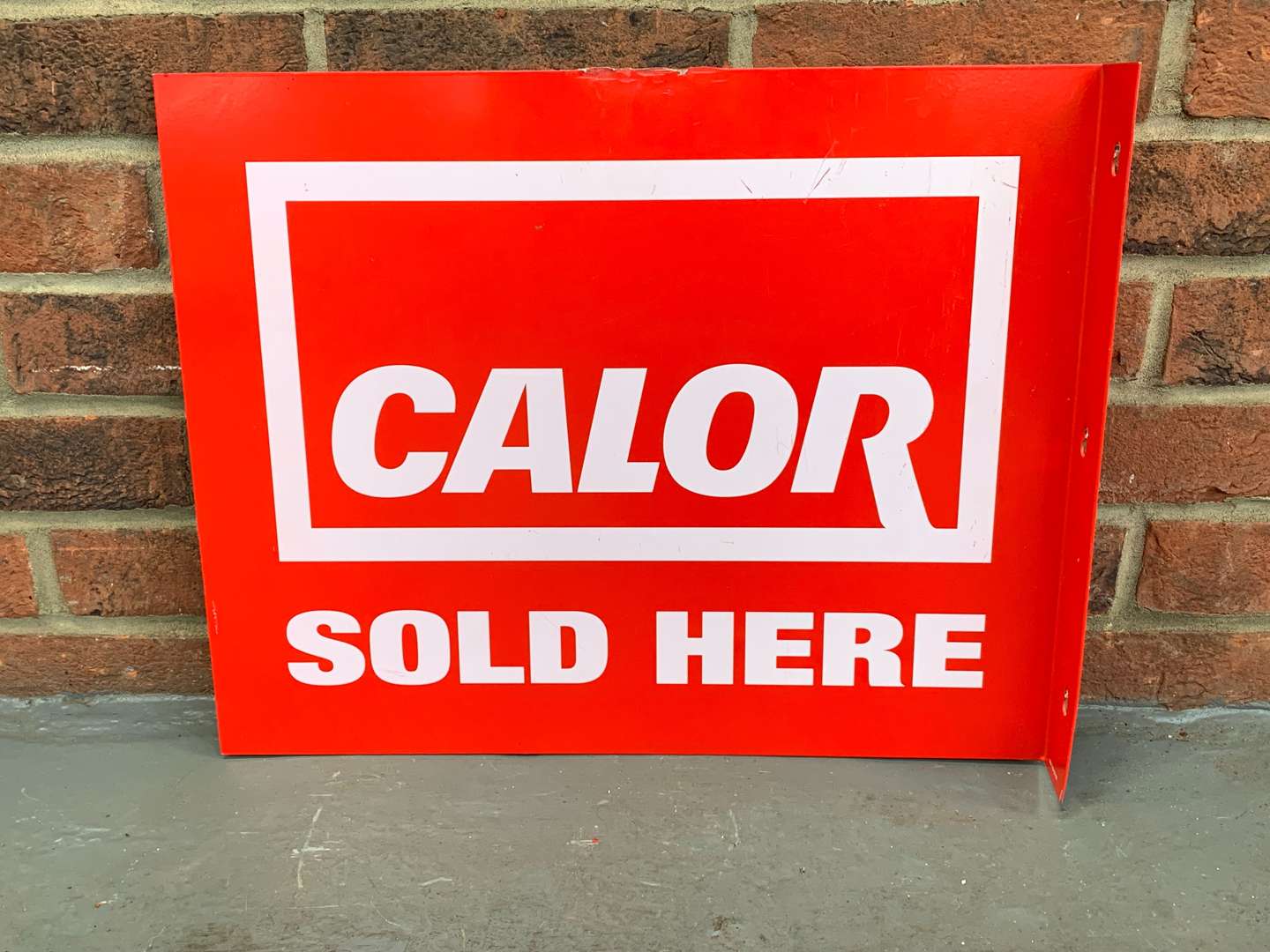 <p>Aluminium Calor Gas Sold Here Flange Sign</p>