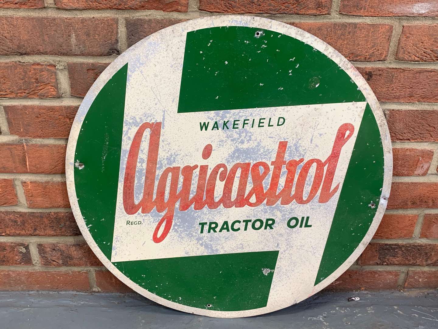 <p>Aluminium Agricastrol Tractor Oil Circular Sign</p>