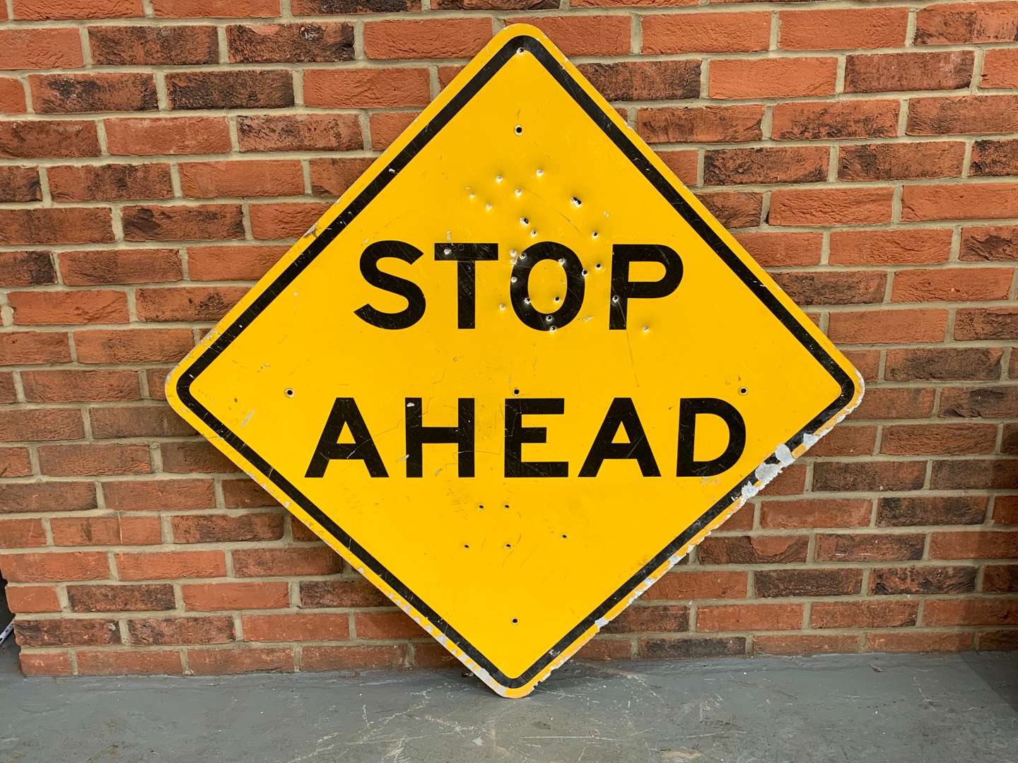 <p>American Stop Ahead Sign</p>