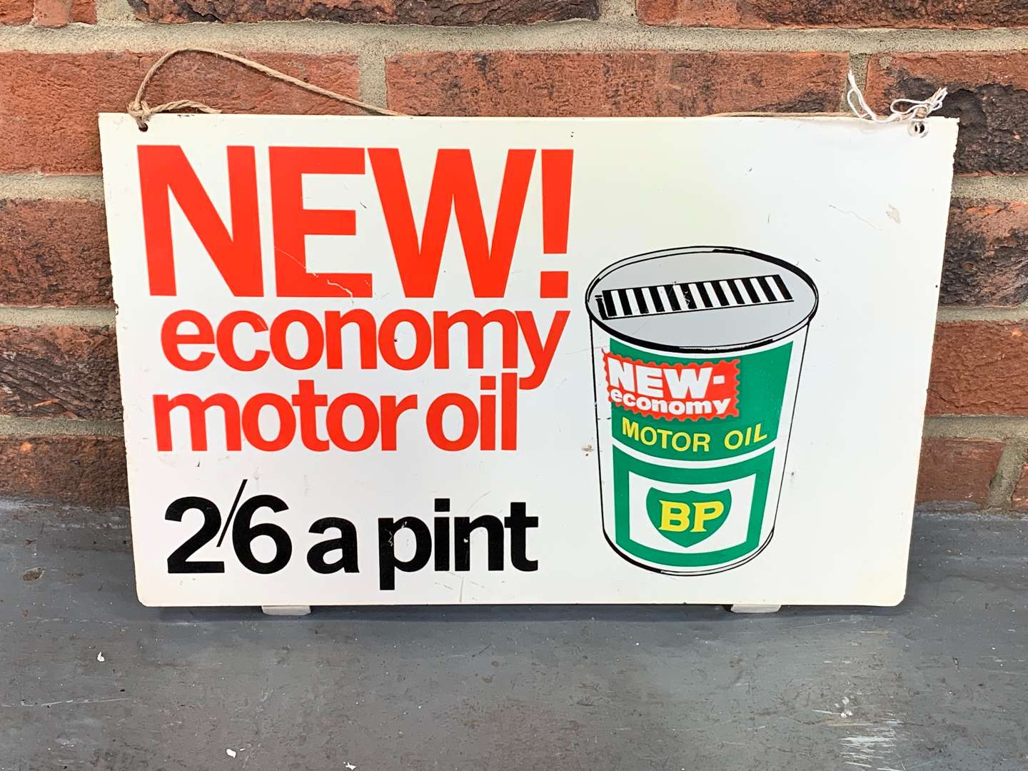 <p>Metal BP Motor Oil New Economy Motor Oil 2'6 A Pint Sign</p>