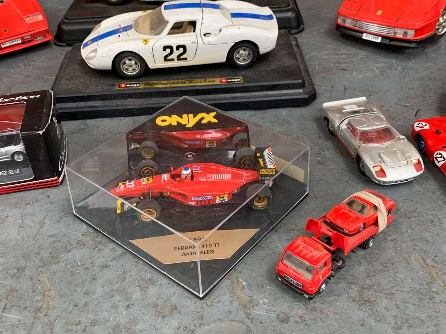 <p>Quantity of Unboxed Die Cast Ferrari Model Cars</p>