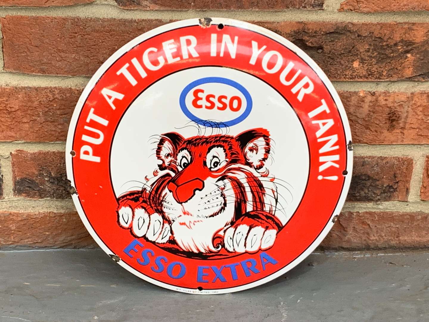 <p>Enamel Convex Esso “Put a Tiger in Your Tank” Sign</p>