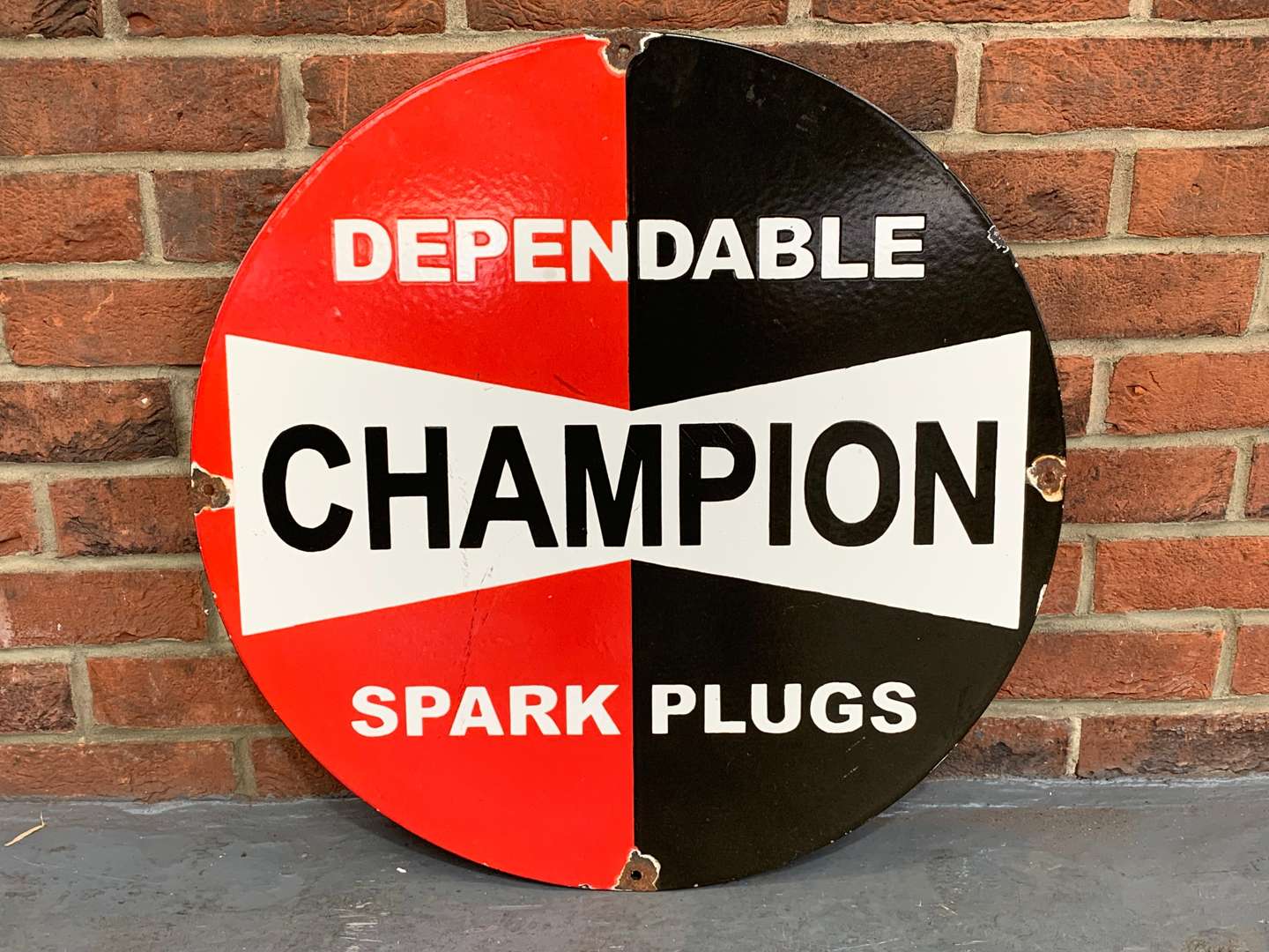 <p>Enamel Dependable Champion Spark Plug Sign</p>