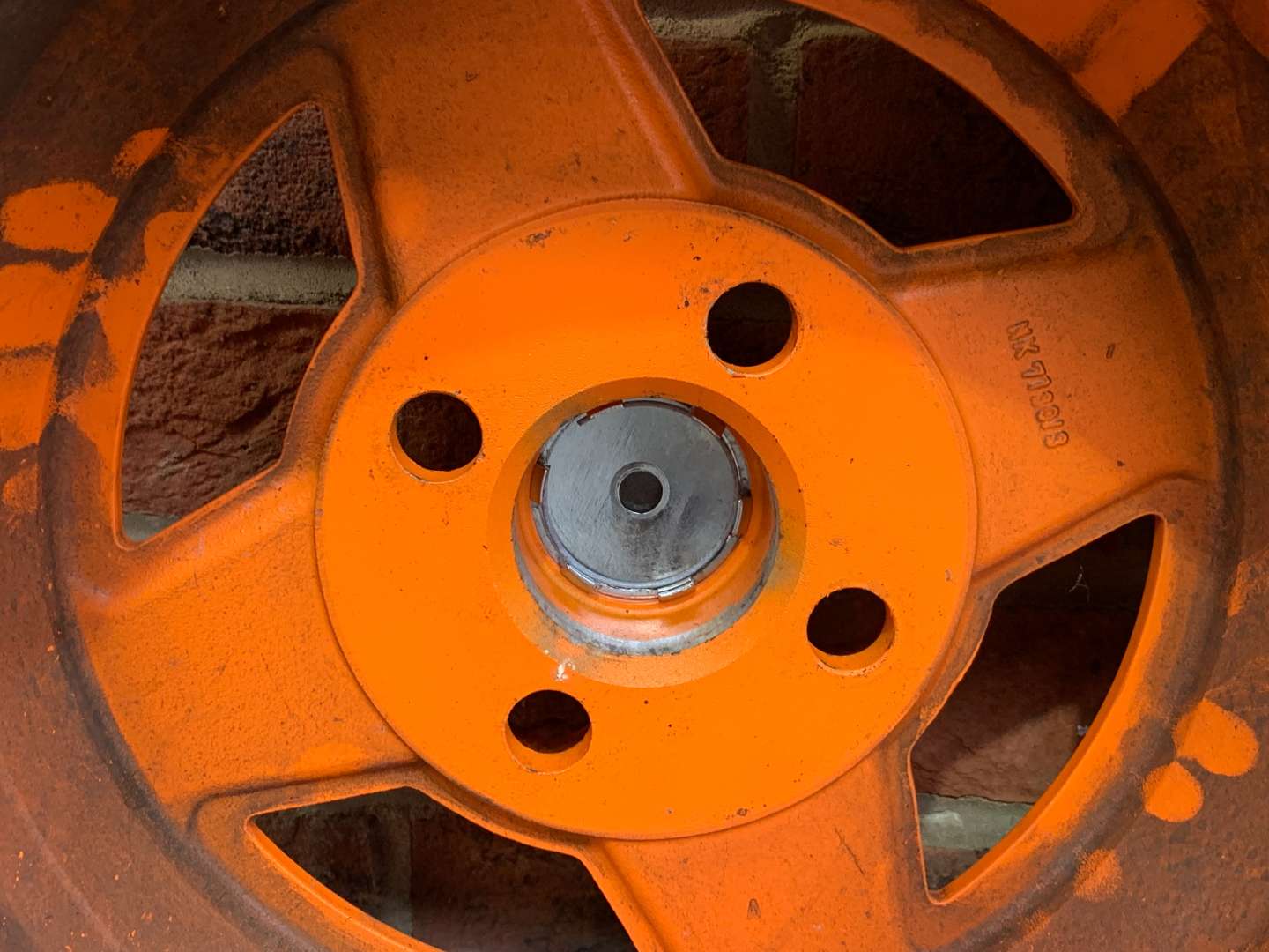 <p>Set of Five Orange Ford Alloy Wheels</p>