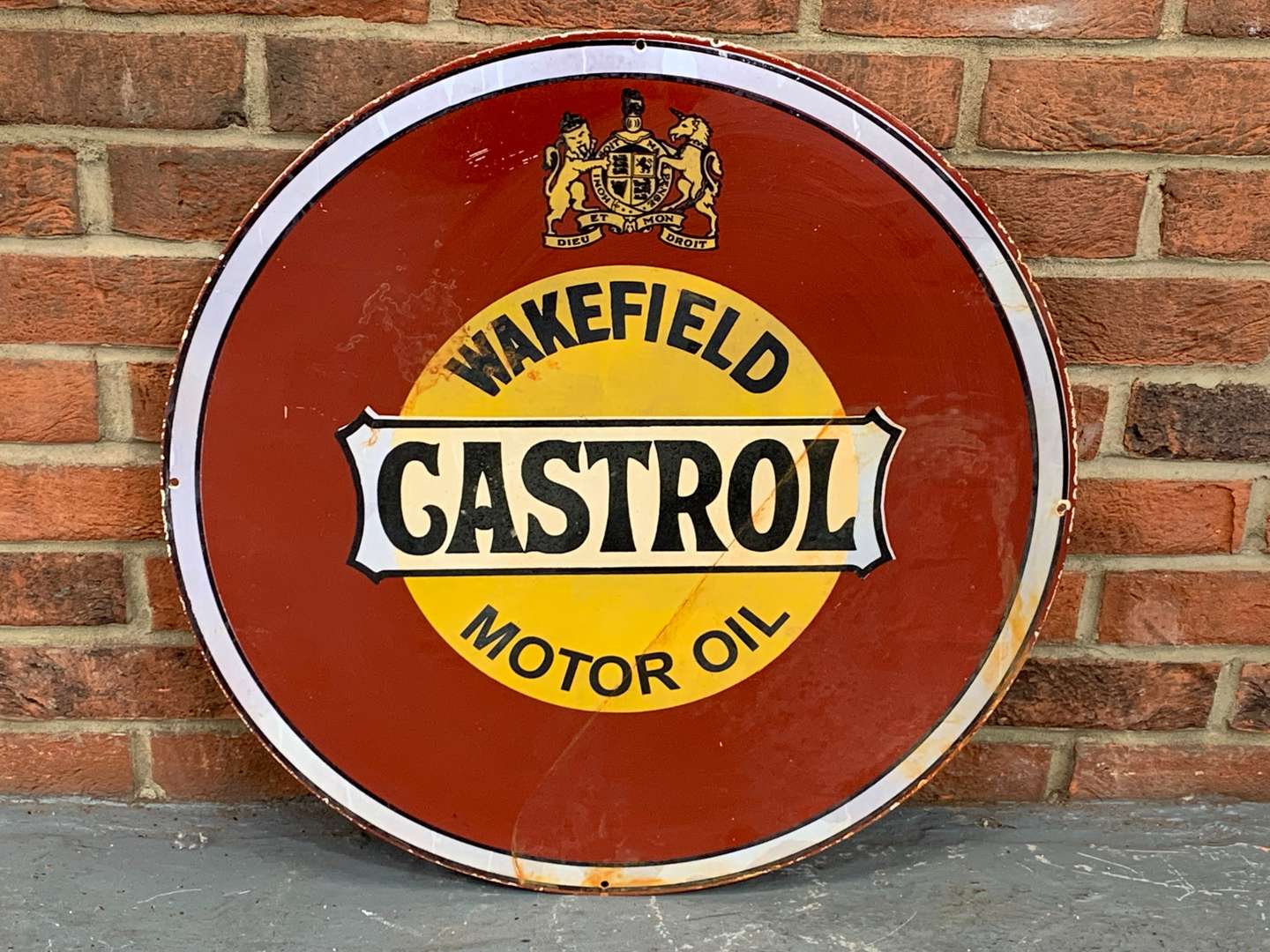 <p>Metal Circular Made Castrol Motor Oil Style Sign</p>