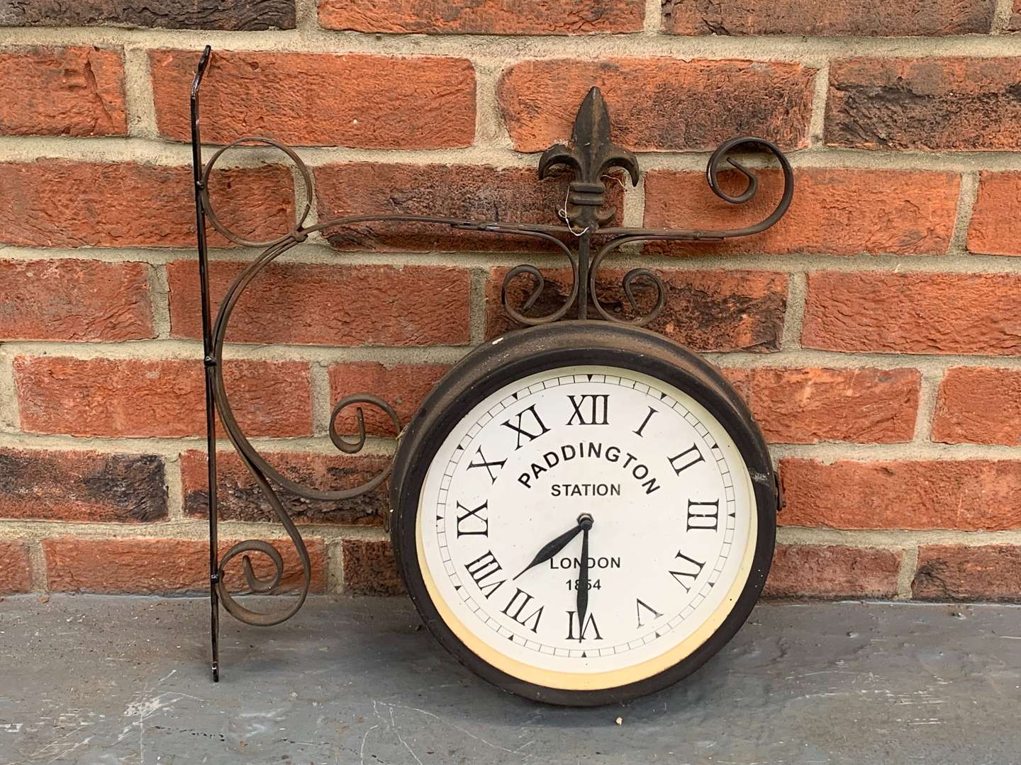 <p>Metal Wall Mounted Paddington Station Clock</p>