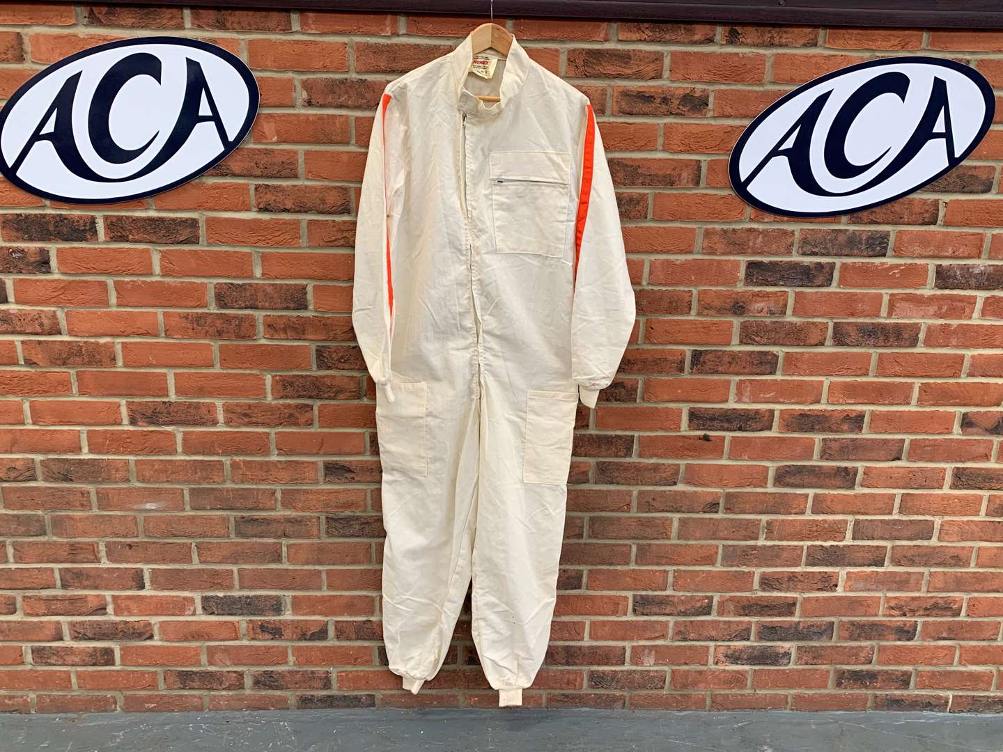 <p>1970's Unused Nomex One Piece Red Stripe Race Suit</p>