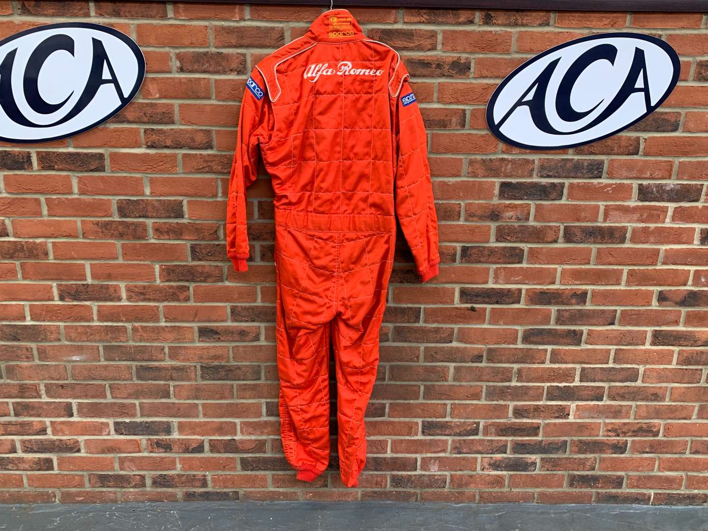 <p>Derek Warwick Prodrive Alfa Romeo 155 Race Suit</p>