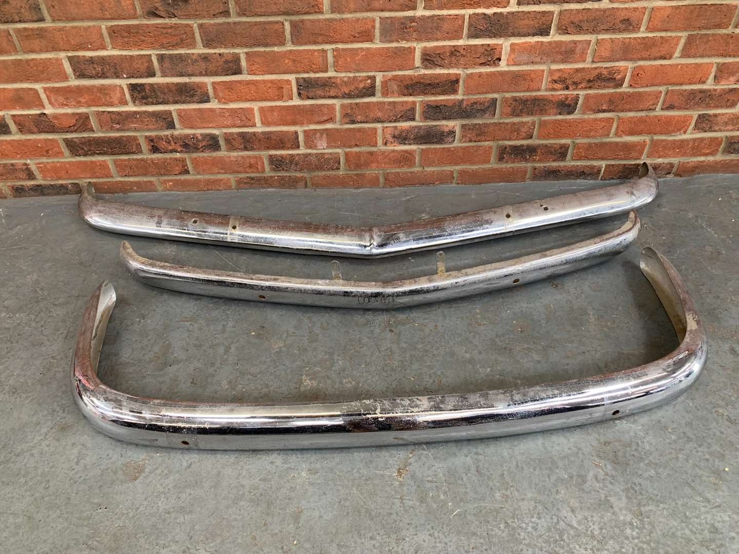 <p>Two Corvair Chrome Bumpers and One Other (3)</p>