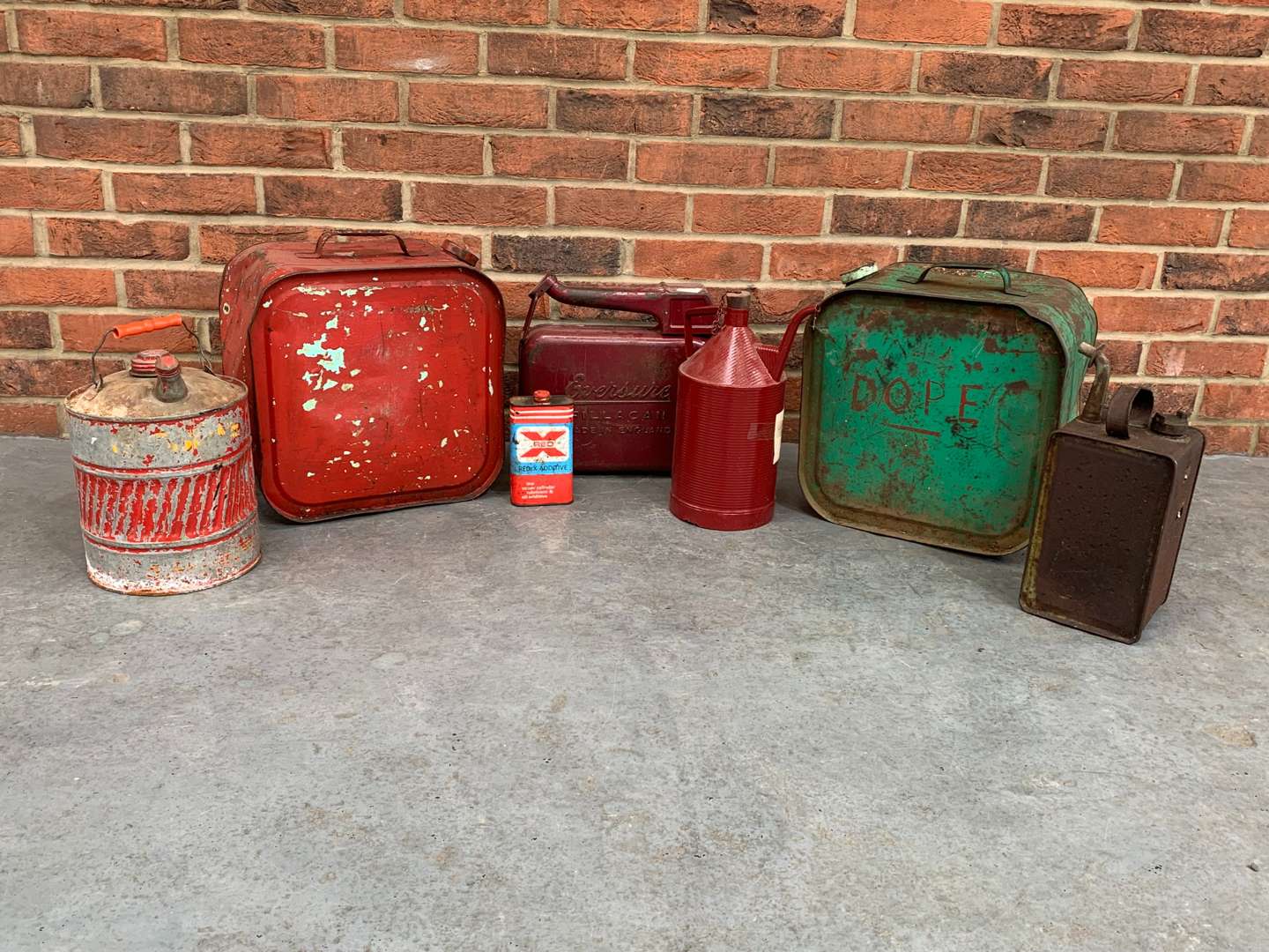 <p>Seven Vintage Oil Cans</p>