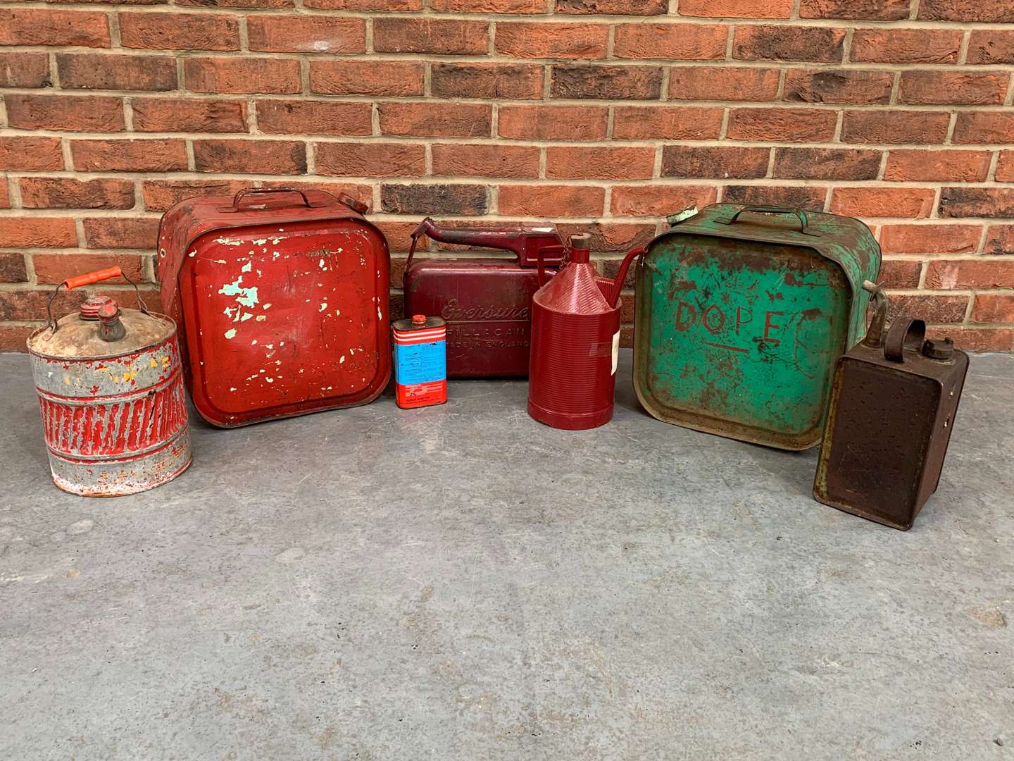 <p>Seven Vintage Oil Cans</p>