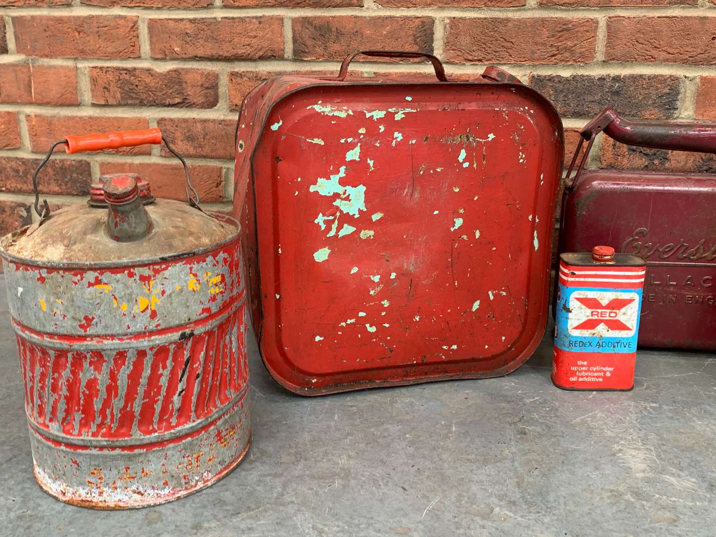 <p>Seven Vintage Oil Cans</p>