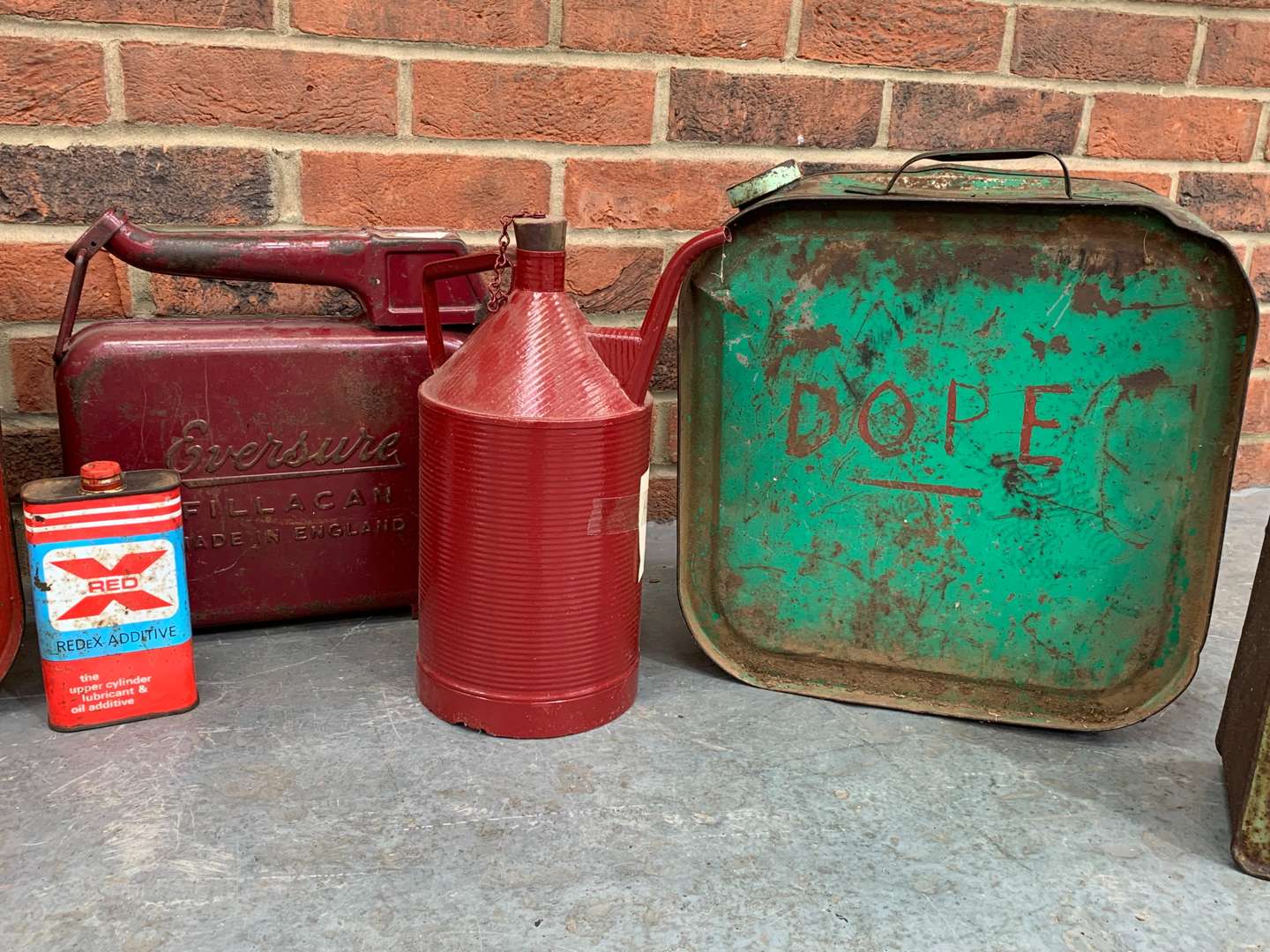 <p>Seven Vintage Oil Cans</p>