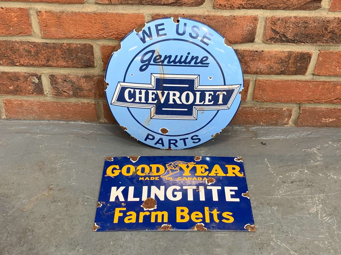 <p>Two Enamel Chevrolet and Goodyear Signs</p>