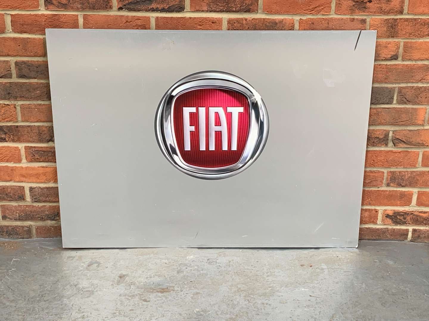 <p>Fiat Sign on Metal Board</p>