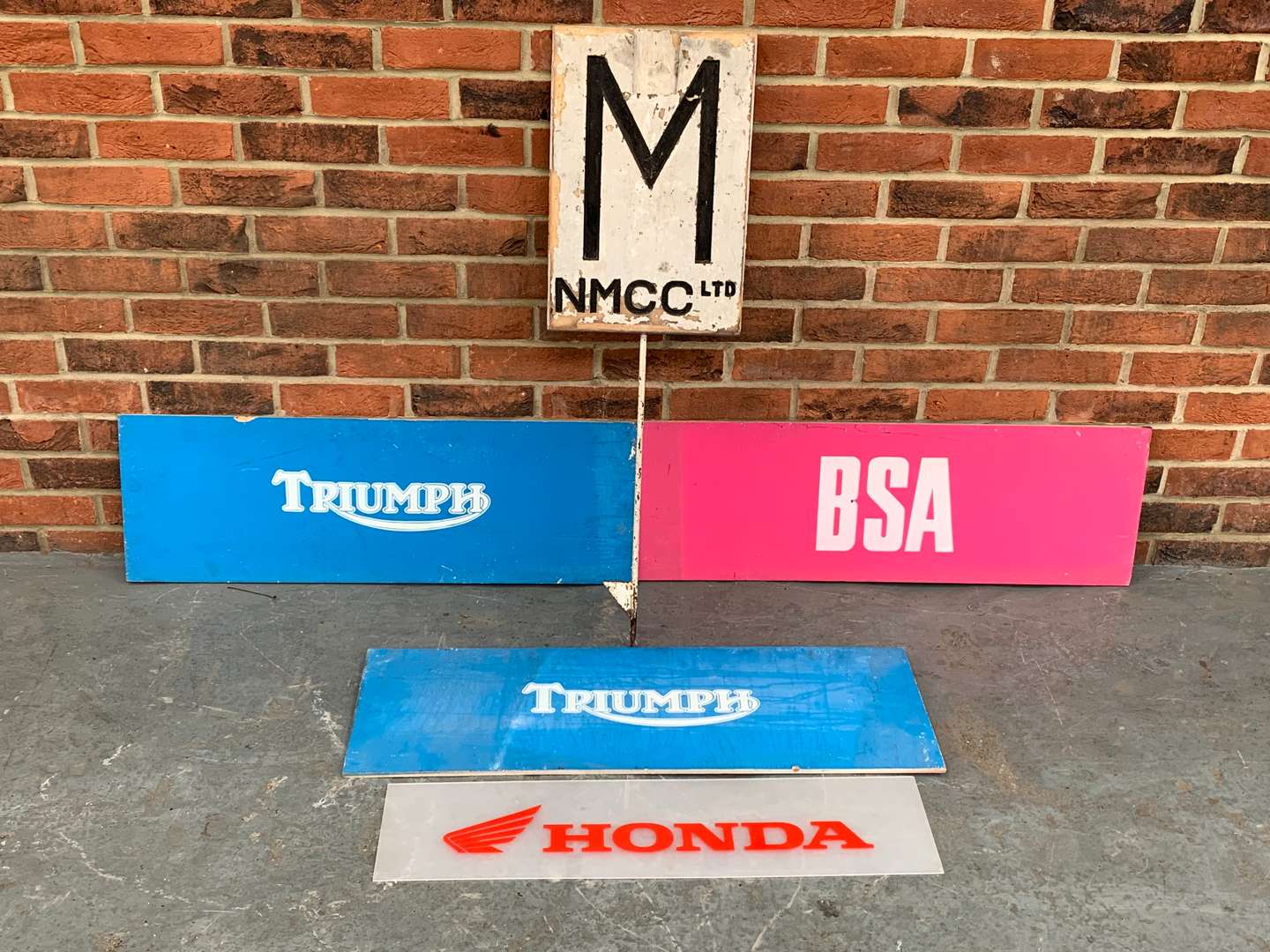 <p>Painted Triumph, BSA and Honda Signs</p>