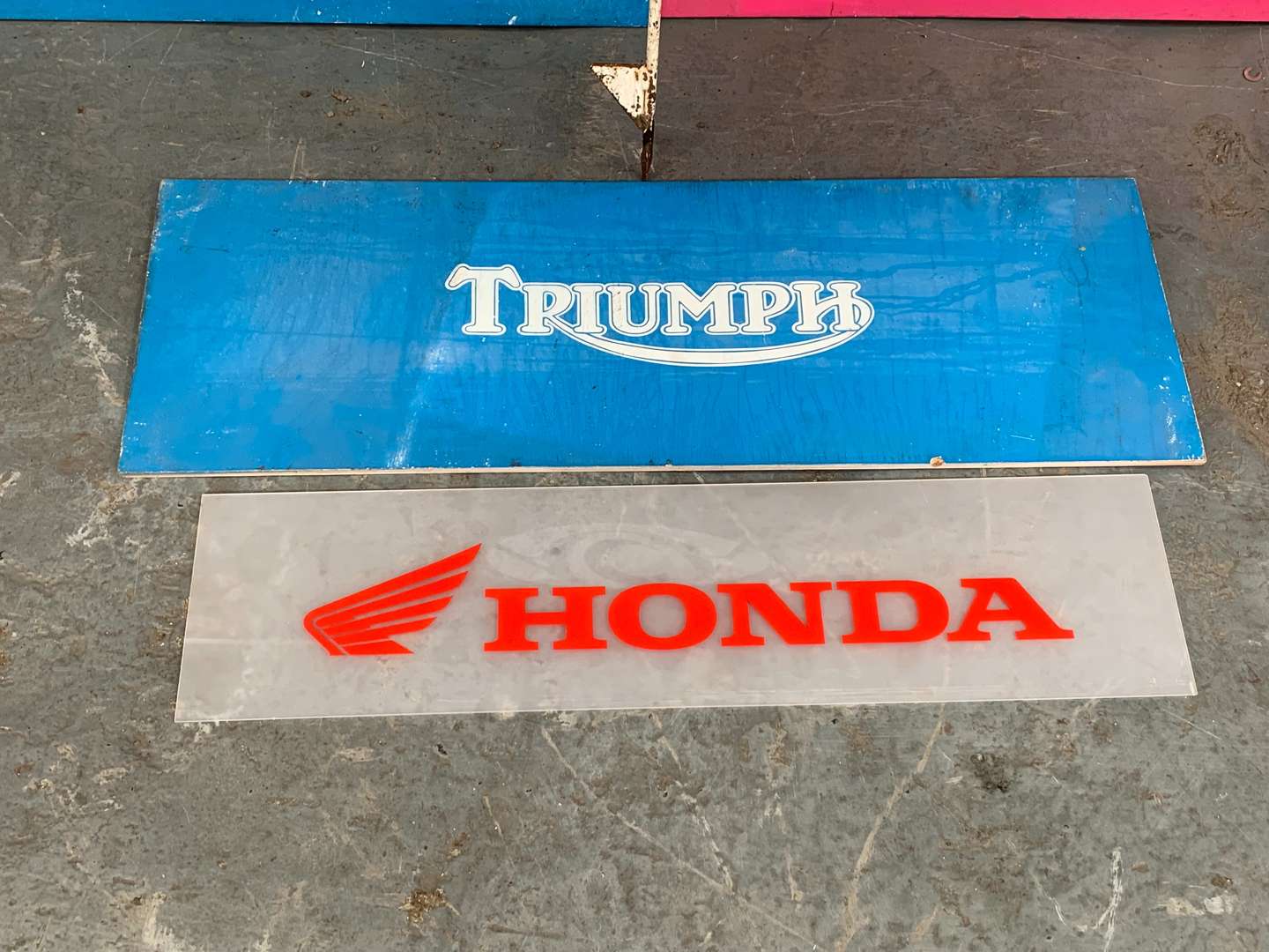 <p>Painted Triumph, BSA and Honda Signs</p>