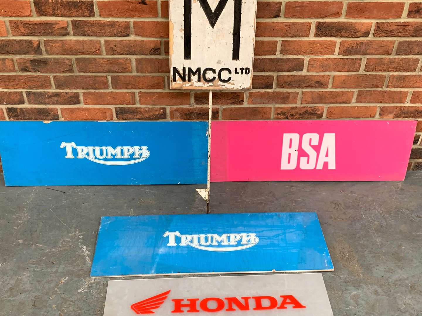 <p>Painted Triumph, BSA and Honda Signs</p>