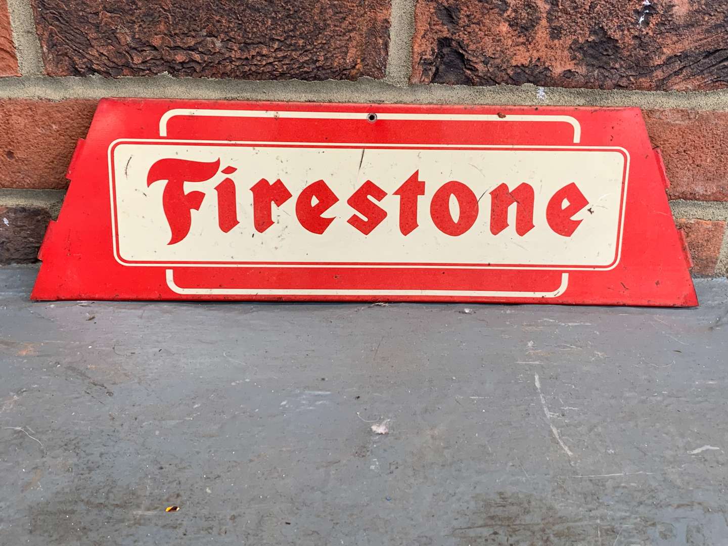 <p>Metal Firestone Sign&nbsp;</p>