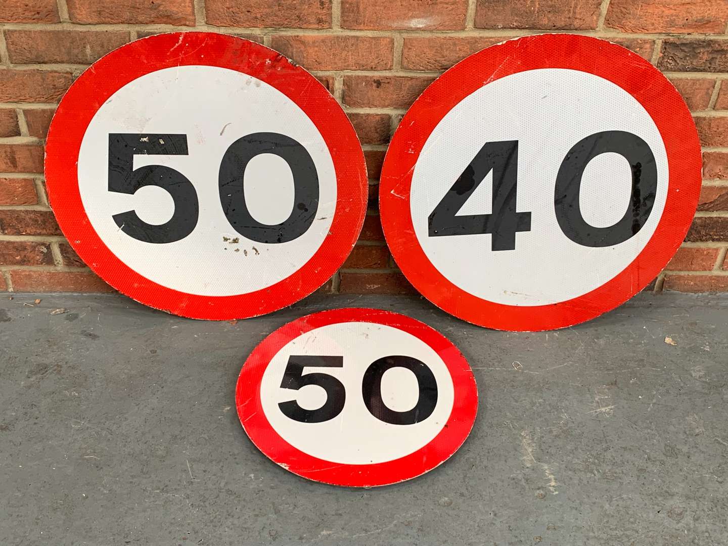 <p>Three Road Speed Limit Signs</p>