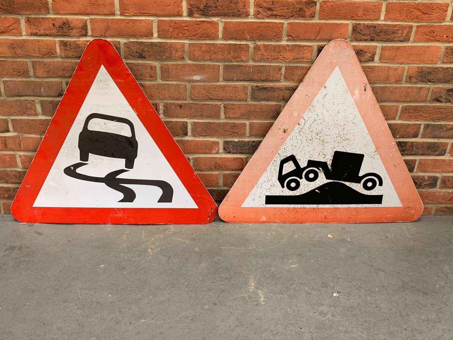 <p>Two Triangular Road Warning Signs</p>