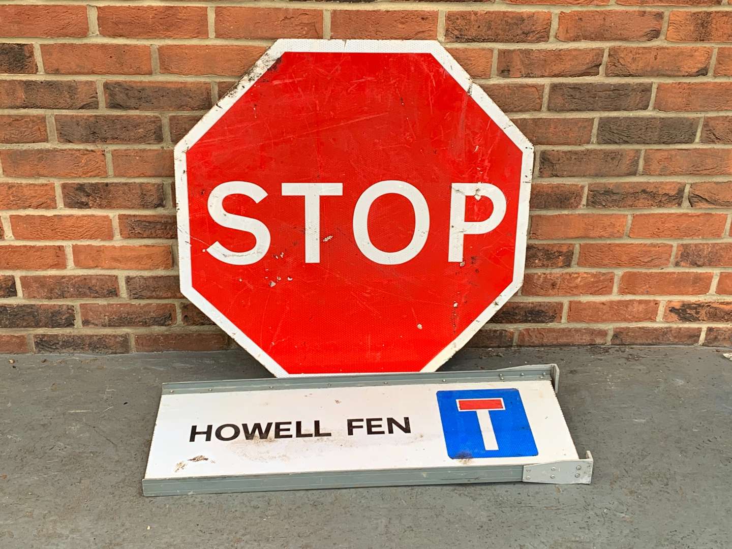 <p>Large Stop Road Sign and Howell Fen Sign (2)</p>