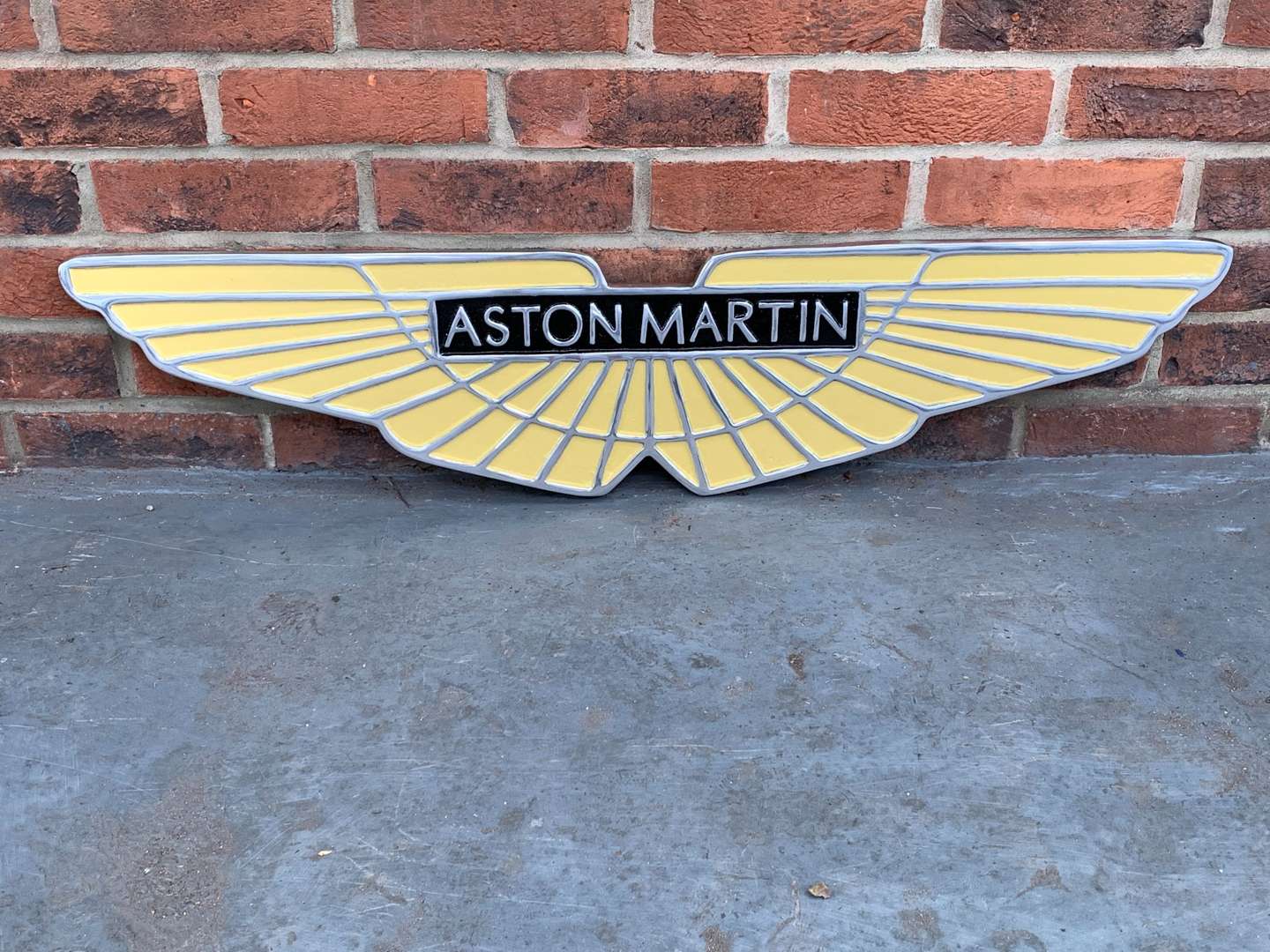 <p>Cast Aluminium Aston Martin Emblem Sign&nbsp;</p>