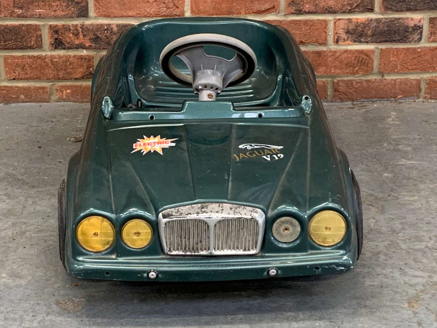 <p>Toys Toys Green Plastic Jaguar Childs Battery Car</p>