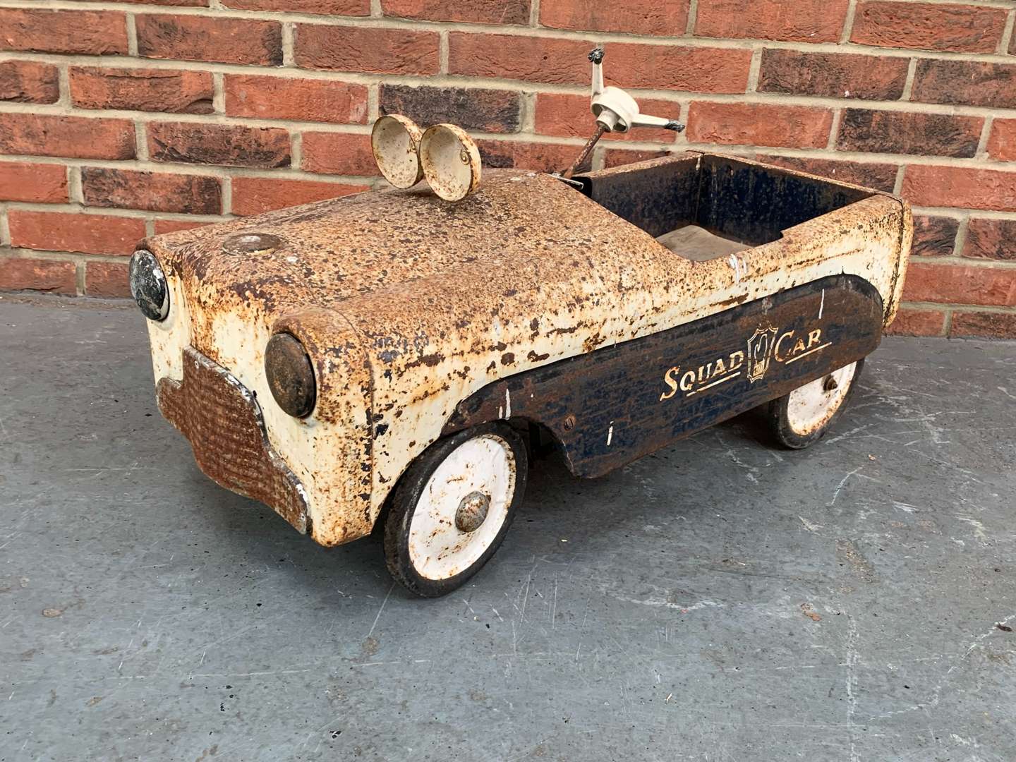 <p>Vintage Tin Plate “Squad Car” Childs Pedal Car</p>