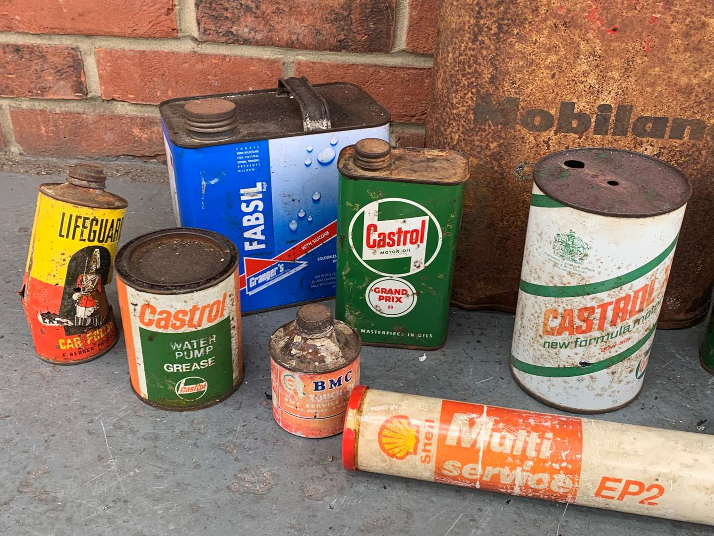 <p>Box of Vintage Oil Cans</p>
